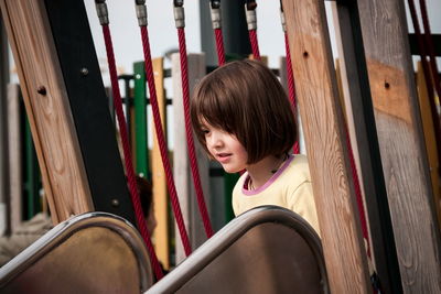 Girl standing at playground