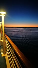 Scenic view of sea against clear sky at sunset