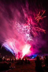 Firework display at night