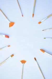 Low angle view of flags against white background