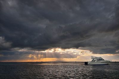 Scenic view of sea against cloudy sky