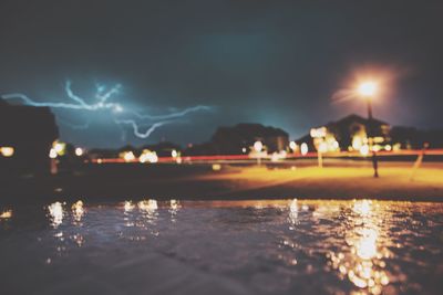 Reflection of illuminated buildings in water