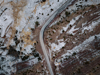 High angle view of road on snowy mountains
