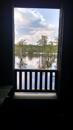 View of railing against cloudy sky