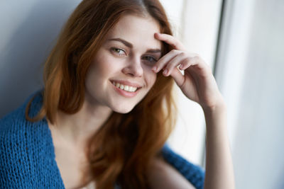 Portrait of smiling young woman