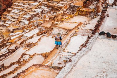 High angle view of woman walking at salt basin