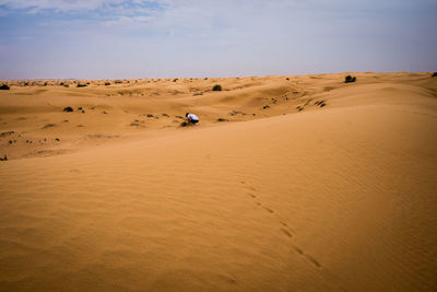 Scenic view of desert against sky