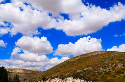 Low angle view of land against sky