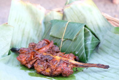 Close-up of meat on barbecue grill