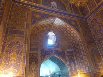 Low angle view of illuminated ceiling of building