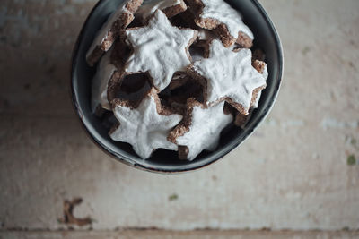 Close-up of bowl full of biscuits