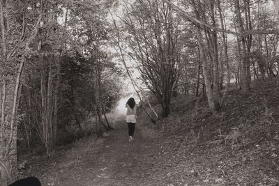 Full length of woman in forest