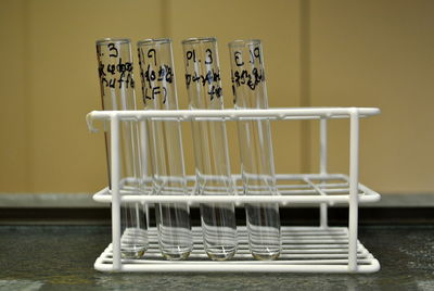 Close-up of test tubes on rack