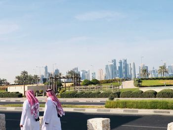 Panoramic view of buildings in city against sky