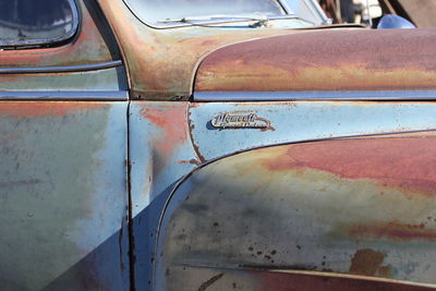 Close-up of abandoned car