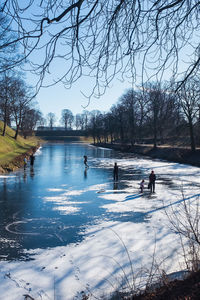 Scenic view of frozen lake against sky