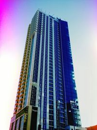 Low angle view of modern building against sky