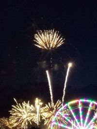 Low angle view of firework display