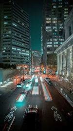 Traffic on city street at night