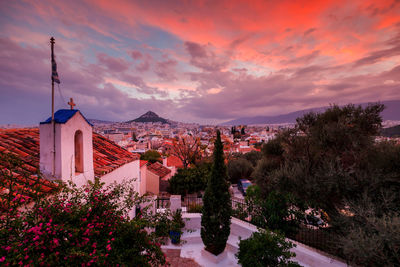 View of lycabettus hill from anafiotika neighborhood in athens.