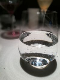 Close-up of wine in glass on table