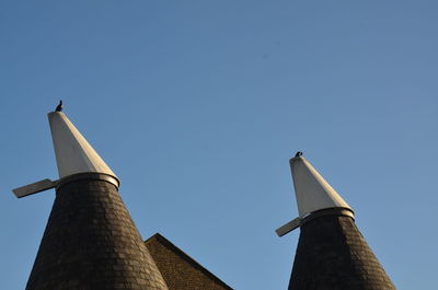 Low angle view of built structure against clear sky