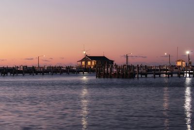 Scenic view of sea against clear sky during sunset