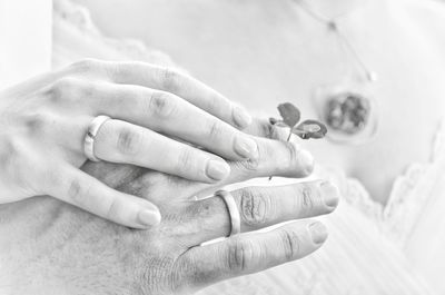 Cropped image of woman holding hands