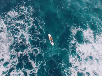 High angle view of person swimming in sea