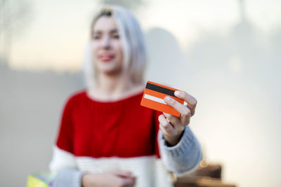 Young woman using mobile phone