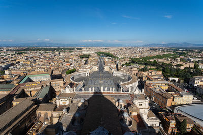 High angle view of city buildings against sky