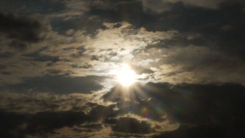 Low angle view of cloudy sky at sunset