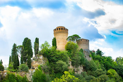 Low angle view of old ruins against sky