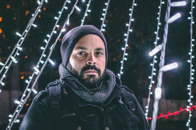 Portrait of man looking at night