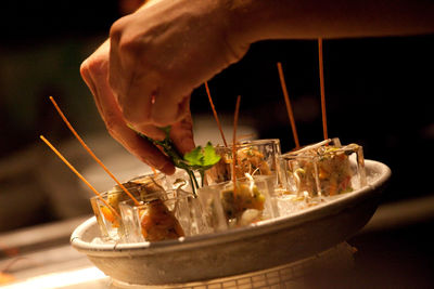 Close-up of hand holding ice cream
