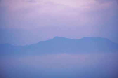 Scenic view of mountains against sky during sunset