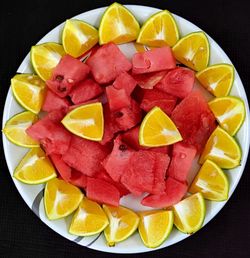 High angle view of chopped fruits in plate
