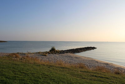 Scenic view of sea against clear sky