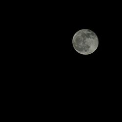 Low angle view of moon in sky