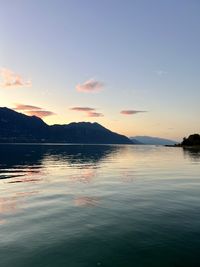 Scenic view of lake against sky during sunset