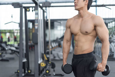 Man exercising in gym