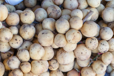 Full frame shot of onions for sale at market stall