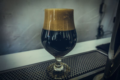 Close-up of wine glass on table