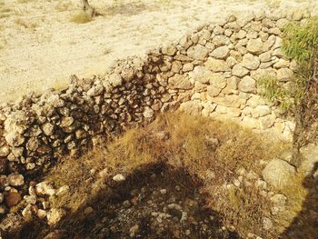 High angle view of stones on field