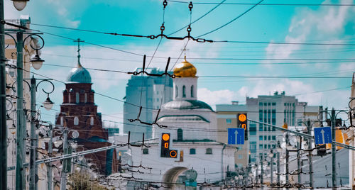 Low angle view of buildings against sky in city