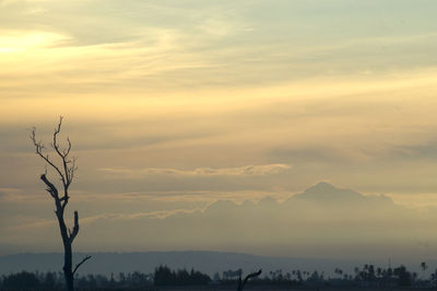 Scenic view of silhouette landscape against sky during sunset