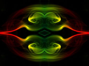 Digital composite image of light painting against black background