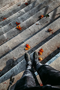 Low section of man standing on floor