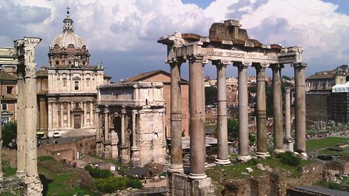 View of roman ruins against cloudy sky