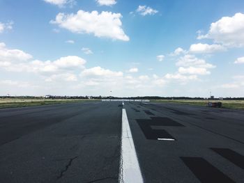 Empty road against sky